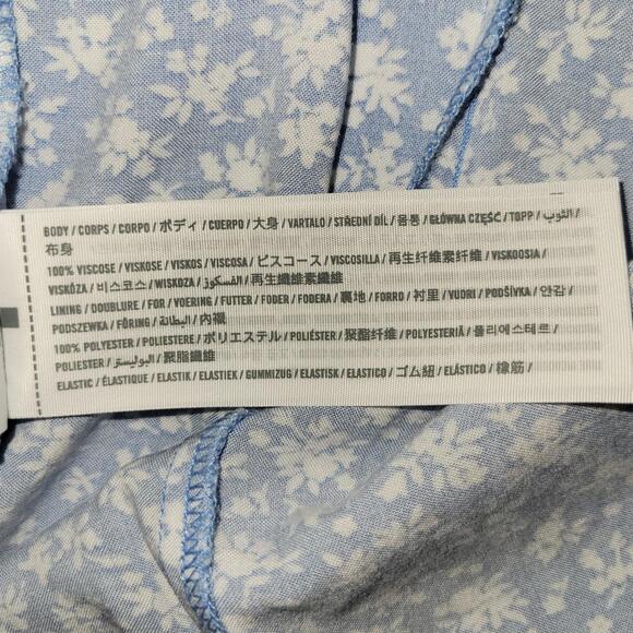 Hollister Short Puff Sleeve Dress Blue Ditsy Floral Smocked Side Split L NWT - Picture 7 of 8